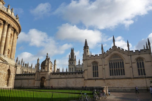 Magnificent old buildings dominate the skyline: All Souls College next to the Radcliffe Camera.