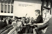 John F. Kennedy is received enthusiastically by the audience in Dahlem.