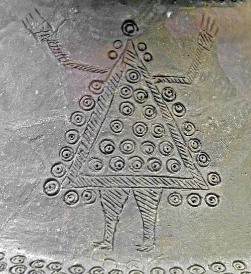 Representation of a dancer in rich costume on a vessel from the cemetery at Sopron-Burgstall in Hungary. The vessel is currently in the Natural History Museum in Vienna.