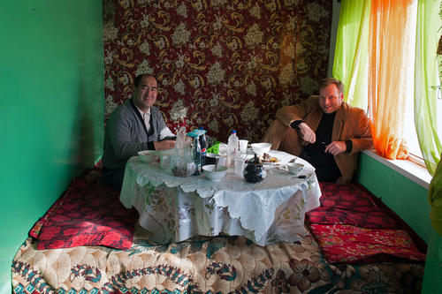 Talking about peace: Jan Koehler (at right) speaks to Kanybek Abduvasitovich Isakov, the rector of Osh State University in southern Kyrgyzstan, about ethnic tensions in the region.