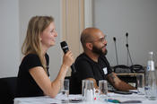 Hier moderieren die Doktoranden selbst: Laura Maschirow und Bruno Rocha Cordeiro Costa promovieren an der Charité - Universitätsmedizin Berlin und leiteten die Immunology Session des Symosiums.