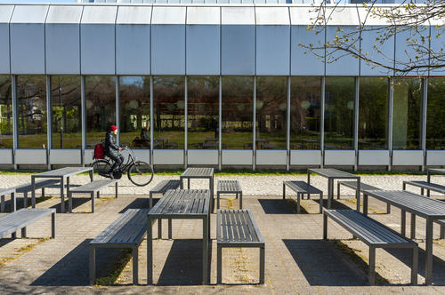 These tables are unused for the time being: Instead of going to the student dining services, many students are now cooking at home.