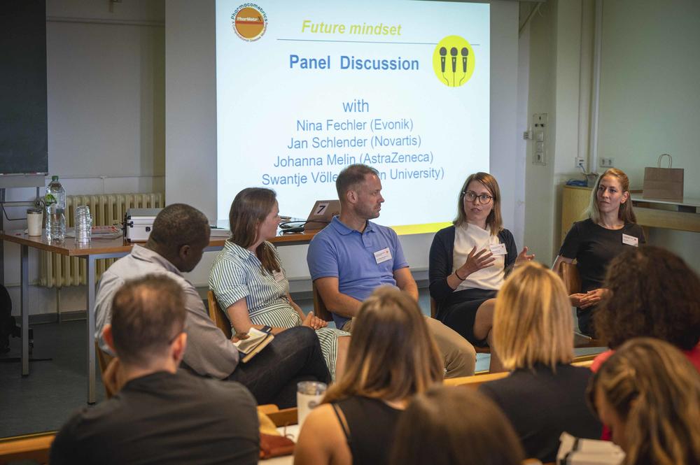 Learning from one another: Graduates from the program at a panel discussion.