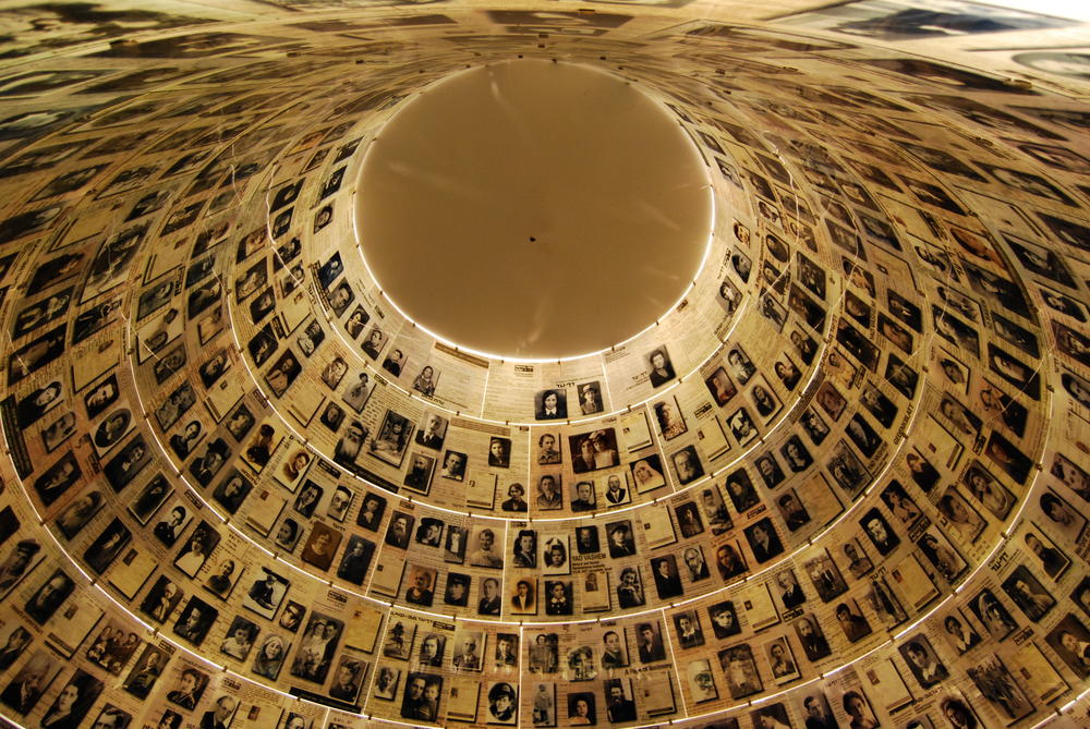 The Hall of Names at Yad Vashem commemorates the victims of the Holocaust. The dome with pictures of many victims is supplemented by a rondel containing black file folders, in which memorial sheets of millions of murdered people are stored.