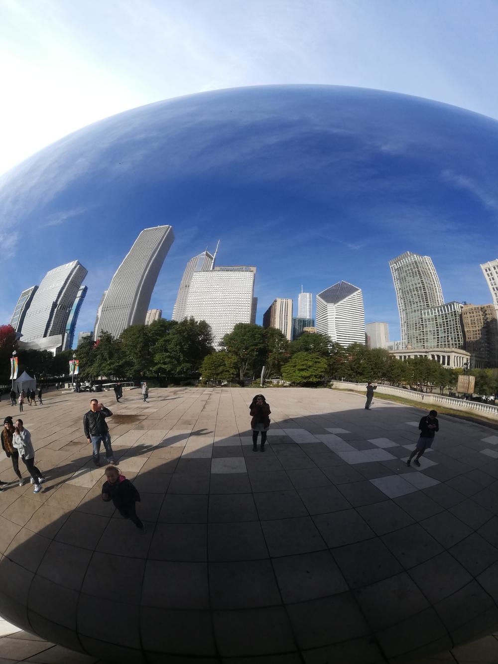 The skyscrapers of Chicago are reflected in the famous public sculpture dubbed “The Bean.”