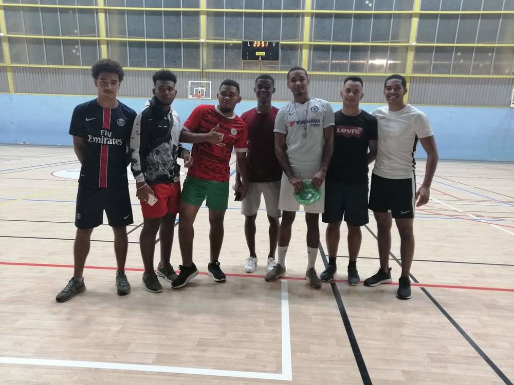 At the futsal tournament, Elias Aguigah (far left) and his team took third place.