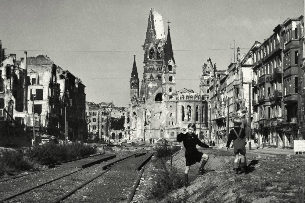 Memorial. In post-war Berlin, children played in front of the ruins of the Kaiser Wilhelm Memorial Church on the destroyed Tauentzienstrasse.