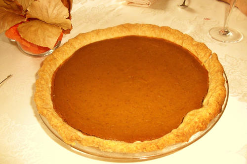 After a delicious dinner, the family enjoyed the perfect pumpkin pie!