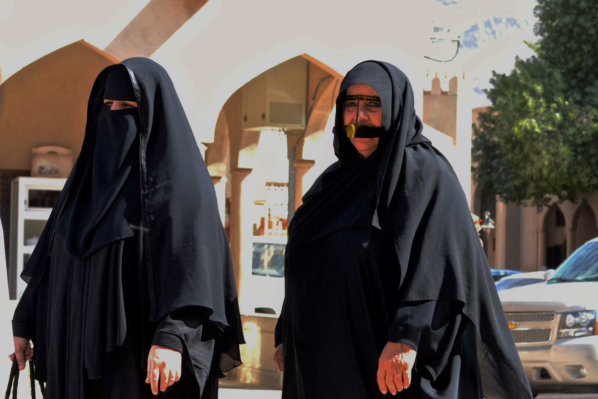 Some women wear a face mask or 'burqa.'