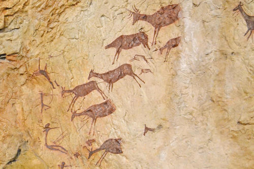 A depiction of a deer hunt in the postglacial period in Cueva de los Caballos, a cave in Spain.