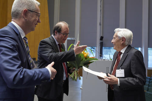Presentation of the honorary degree at the ceremony in the Henry Ford Building