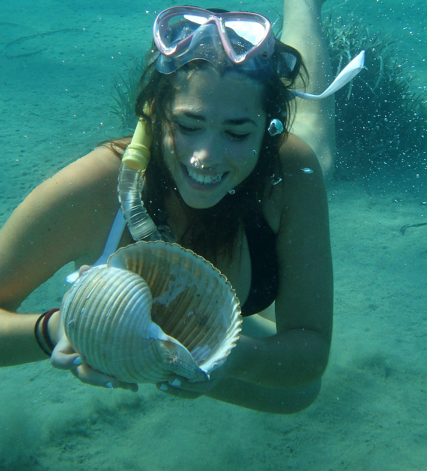 Christina Braoun diving for coral in Greece.