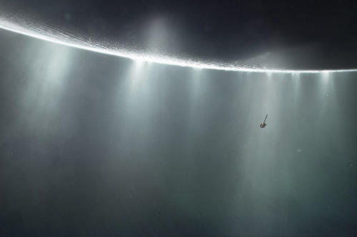 Spray: This illustration shows the Cassini space probe crossing the fountains of water vapor at Enceladus’s south pole.