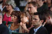 Guests listening intently during the ceremony conferring honorary doctorates.