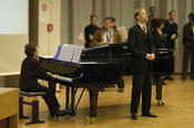 Robert Schumann's version of 'A Poet's Love' by Heinrich Heine, performed by Elżbieta Sternlicht at the piano and Peter Schoene (voice), provided the musical framework for the ceremonial event.
