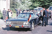 During the President’s speech, his bodyguards wait near the car, a Lincoln X-100.