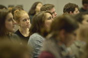 The participants listened attentively while the presenters were speaking.