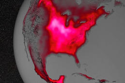 Fluorescent fields: The photo shows a satellite image of North America, with the Corn Belt clearly visible as a light-colored area in the center of the continent.