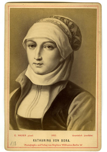 A view from the 19th century, with cap and high-necked dress to symbolize chastity, respectability, and piety. Photograph taken in 1883 from a painting by Ernst Hader.
