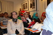 under the watchful eyes of the audience