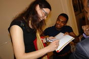and is asked to give autographes