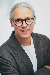 Dr.